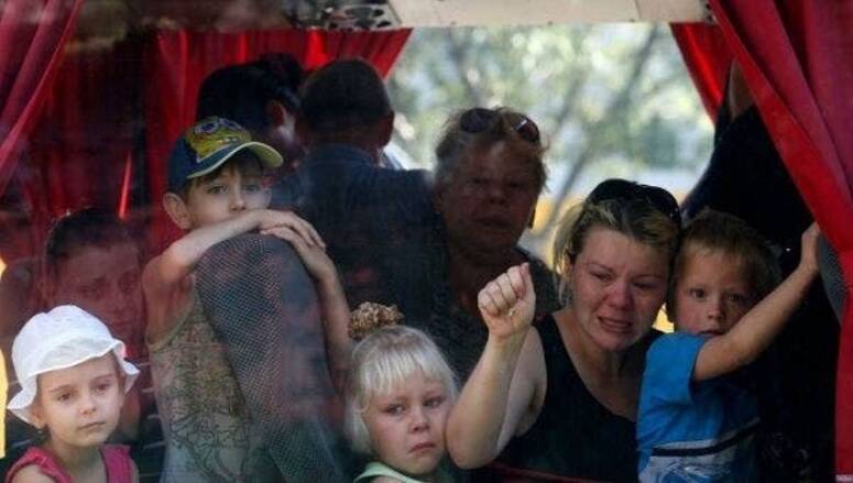 Orphan children displaced towards Russia, Donetsk, Feb. 18, 2022. | Photo: Twitter/ @donbassr