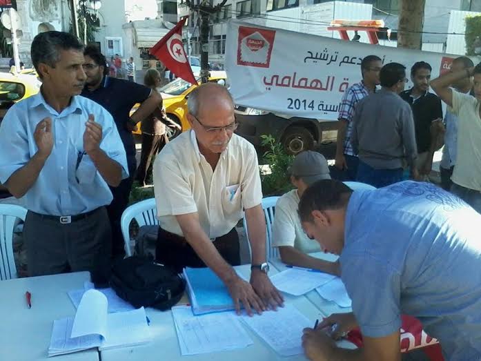 بالصور: أنصار الجبهة ينتشرون في شارع بورقيبة لجمع التوقيعات لحمة الهمامي