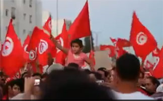 عدد من الفنانين التونسيين يؤدّون أغنية يدعون من خلالها الشعب التونسي إلي الوحدة الوطنية